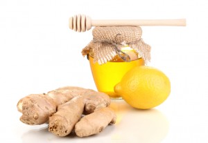 Ginger with lemon and honey isolated on white